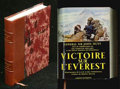 two books that are sitting next to each other on a table