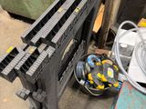 a picture of a pile of assorted tools on a table