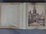 an open book with a picture of a building on it