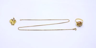 a collection of gold jewellery including a ring and a chain
