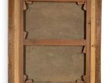 an old wooden picture frame with a brown background and a white background