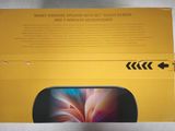 the box is open and the phone is in it ' s packaging