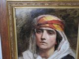 portrait of a woman in a turban in a frame