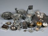 a lot of silver items that are on the table
