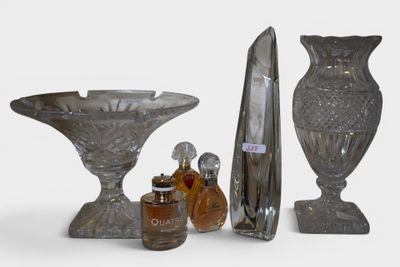 a lot of glass vases that are sitting on a table