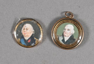 two miniature portraits of two men are shown in a gold - plated frame