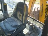 an image of a construction vehicle with a seat in the back