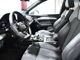 a picture of the interior of a car with a steering wheel