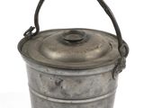 an old metal bucket with a handle on a white background