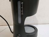 a coffee maker that is sitting on a table