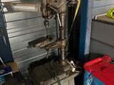 a machine that is sitting next to a blue box