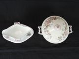two bowls and a bowl on a black background