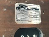 a close up of a piece of wood with a sign on it