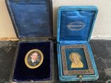 two small blue boxes with a picture of a man in a crown
