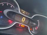 a close up of a speedometer on a car ' s dashboard