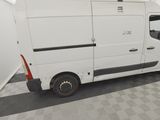 a white van that is parked in a room