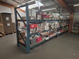 a room with a lot of boxes and boxes on the shelves