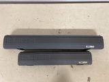 a pair of black rubber steps for a car