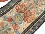two rugs that are on a table together