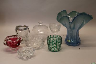 a lot of glass items sitting on a table