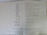a book open to a list of items on a table