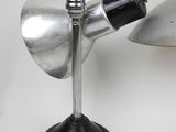a lamp that is on a table next to a lamp