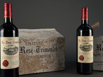 three bottles of wine sitting next to each other on a table