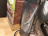 a blender sitting on a counter next to a box of food
