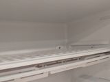 an open refrigerator with a lot of food inside of it