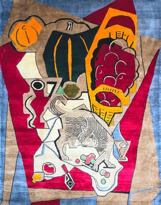 a rug with a painting on it on a blue background