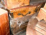 many pieces of furniture that are wrapped up and ready to be shipped