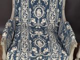 pair of blue and white upholstered armchairs