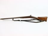 an old rifle on a white background with a gun in the foreground