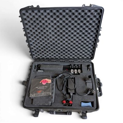 a black case with wires in it on a white surface