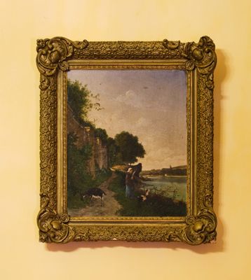 une photo d'un tableau accroché au mur