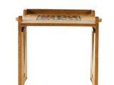 an image of a small wooden table with a tray on top of it