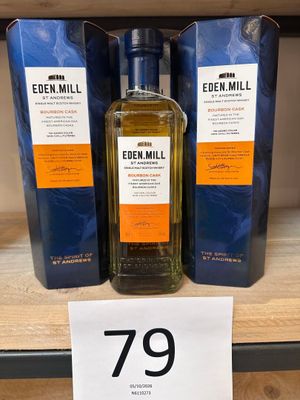 trois bouteilles d'Eden Mill sur une étagère dans un magasin