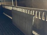 a horse stall with a horse inside of it
