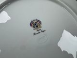a white plate with a picture of a horse on it