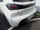 a white car that is parked in a parking lot