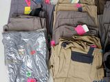 a pile of clothing that is sitting on a table