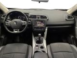 the interior of a car with a steering wheel, dashboard, and dashboard controls