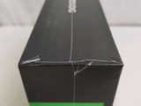 a black box with a green stripe on it