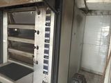 a large oven in the middle of a kitchen