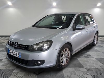 a picture of a silver car parked in a garage
