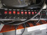 a close up of a control panel with a lot of wires on it