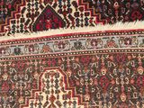 a close up of a rug with a pattern on it