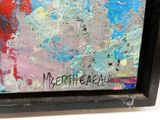 une photo d'un tableau accroché au mur