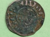 an old coin with a picture of a man on it