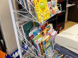 a lot of books on the shelves in the room